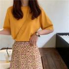 Plain Short-sleeve T-shirt / Floral A-line Midi Skirt