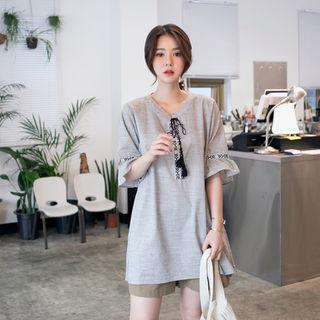 Tasseled-neck Ruffled-sleeve Top