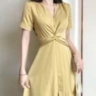Short-sleeve Twist-front Midi A-line Dress