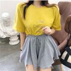 Lettering Short-sleeve T-shirt / High-waist Loose-fit Skort