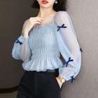 Long-sleeve Bow-accent Smocked Cropped Top