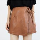 Bow Faux Leather Mini Skirt