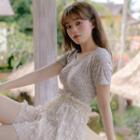 Set: Short-sleeve Floral Print Swimsuit + Swim Skirt