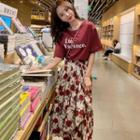 Set: Short-sleeve Lettering T-shirt + Floral Midi A-line Skirt