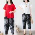Set: Short-sleeve Asymmetric T-shirt + Crop Harem Pants