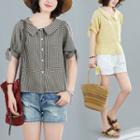 Short-sleeve Tie-cuff Gingham Peplum Blouse