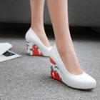 Hedge-heel Pumps
