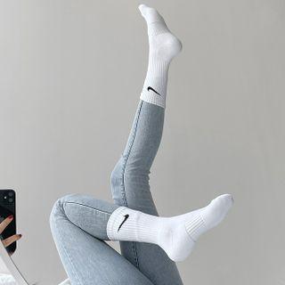 Irregular Washed Skinny Jeans