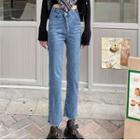High-waist Asymmetric Denim Jeans