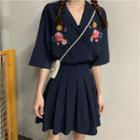 Elbow-sleeve Embroidered Flower Shirt / A-line Mini Pleated Skirt