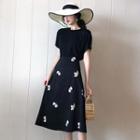 Set: Short-sleeve Open Back T-shirt + Printed A-line Midi Skirt