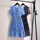 Short Sleeve Tie-neck Floral Pleated Chiffon A-line Dress