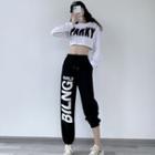 Long-sleeve Lettering Cropped T-shirt / High-waist Jogger Sweatpants
