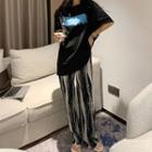 Set: Elbow-sleeve Lettering Print T-shirt + Wave Print Wide Leg Pants