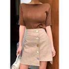 Buttoned Linen Mini Wrap Skirt