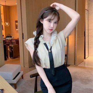 Sleeveless Ruffle Trim Blouse / Mini Pencil Skirt
