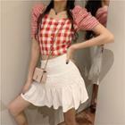Short-sleeve Plaid Blouse / High-waist Ruffled Skirt
