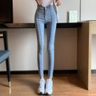 Cold-shoulder Long-sleeve Top / High-waist Skinny Jeans