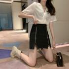 Set: Short Sleeve Knotted V-neck Top + Double Zipper A-line Skirt