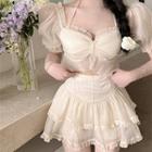 Short-sleeve Ruffle Top / A-line Skirt