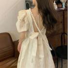 Puff-sleeve Square-neck Open-back Bow Accent Dress