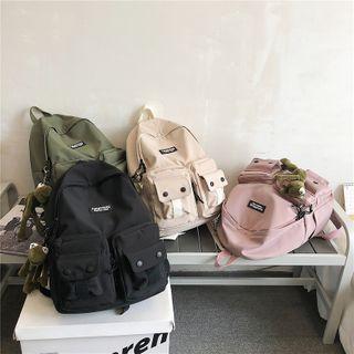 Front Pocket Buttoned Canvas Backpack