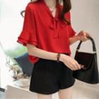 Flared-sleeve Tie-neck Blouse