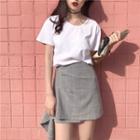Plain Short-sleeve T-shirt / Check Asymmetric A-line Skirt