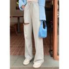 Drawstring-waist Ripped Straight-cut Sweatpants