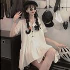 Short-sleeve Buttoned Asymmetric A-line Mini Dress