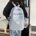 Buckled Zip Nylon Backpack