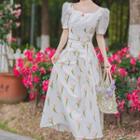 Set: Puff-sleeve Floral Blouse + Midi A-line Skirt