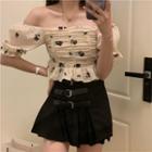 Puff-sleeve Off-shoulder Floral Print Frill Trim Crop Top / Buckled Pleated Mini A-line Skirt