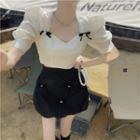Short-sleeve Bow Accent Top / A-line Skirt