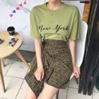Short-sleeve Lettering T-shirt / Mini Plaid Skirt