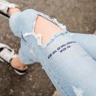 Lettering Cutout-knee Tapered Jeans