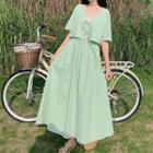 Set: Elbow-sleeve Front Knot Blouse + Midi A-line Skirt