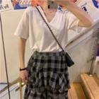 Short-sleeve Plain T-shirt / Plaid Layer Pleated Midi Skirt