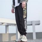 Cropped Camouflage Panel Lettering Jogger Pants