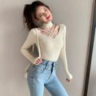 Long-sleeve Strappy Cutout Mock-neck Knit Top