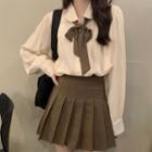 Long-sleeve Tie-strap Shirt / Pleated Mini A-line Skirt