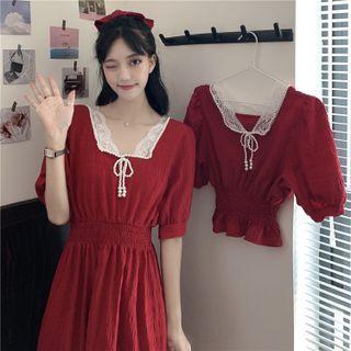 Short-sleeve Faux Pearl Embellished Peplum Top