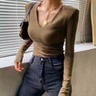 Long-sleeve Shoulder-padded V-neck Top