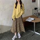 Long-sleeve V-neck Plain Knit Top / High-waist Floral A-line Skirt