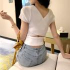 Cut-out V-neck Short-sleeve Knit Top