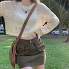 Long-sleeve Pointelle Cropped Top / High-waist Dual-pocket A-line Mini Skirt
