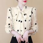 Dotted Tie-neck Ruffled Blouse