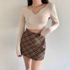 Long-sleeve V-neck Plain Crop Top / High-waist Plaid Skirt