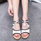 Tasseled Piped Sandals