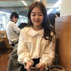 Long-sleeve Ruffle Trim Buttoned Blouse Off-white - One Size